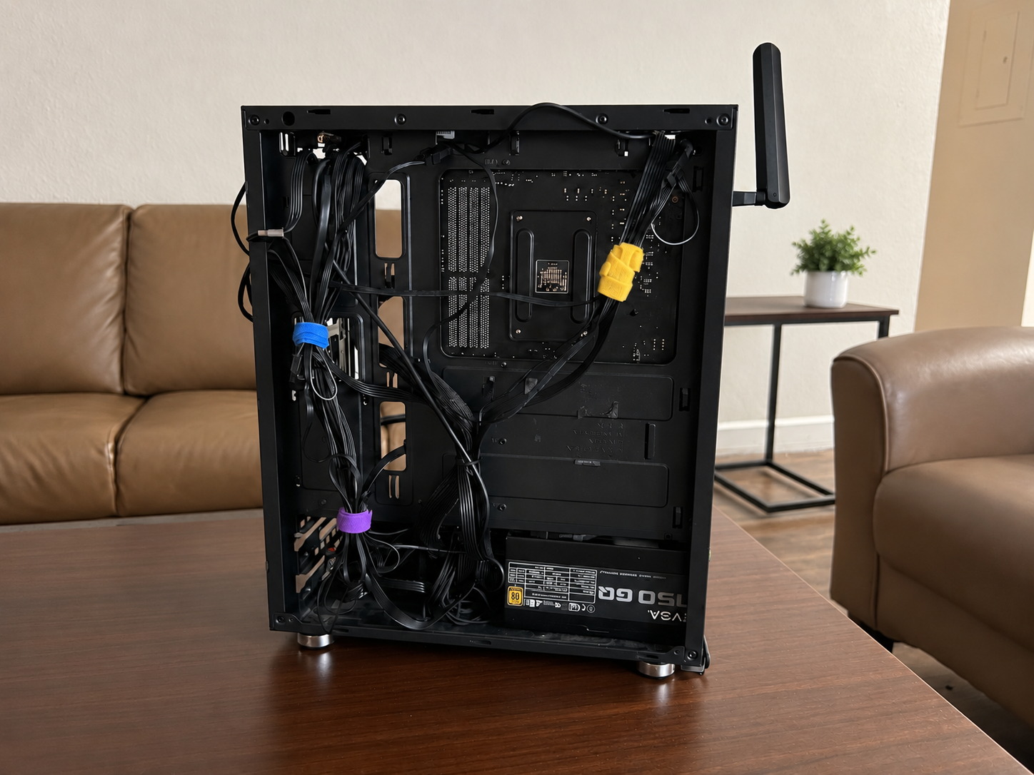 Rear cable management work on a PC build